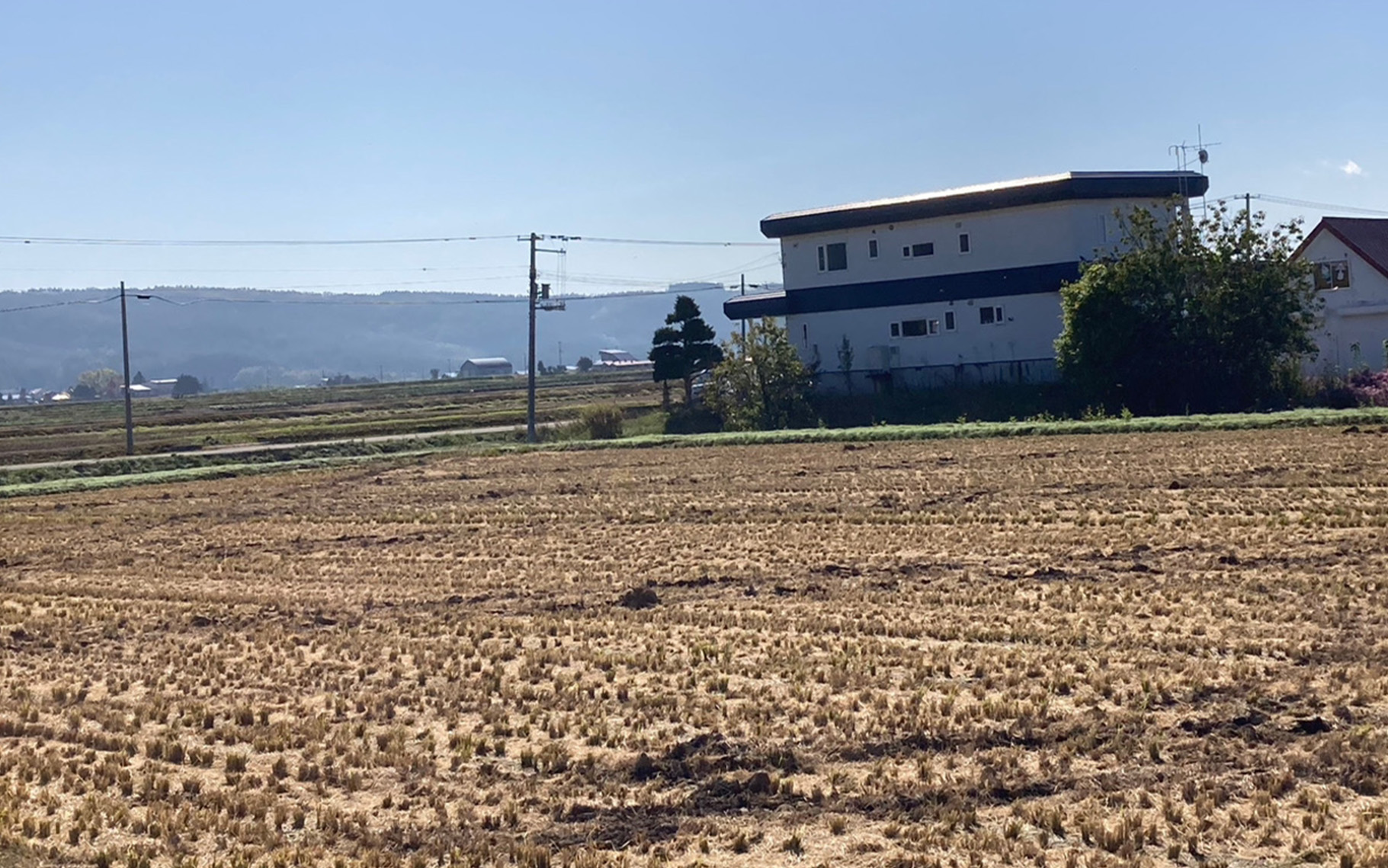 a vacation rental surrounded by fields